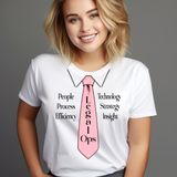 Person wearing a white t-shirt with a pink tie graphic and text on a gray background